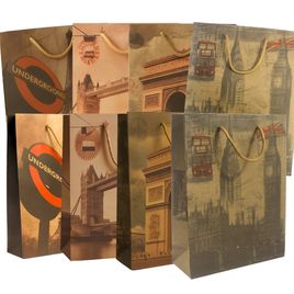 Kit 12 Sacolas de Presente Kraft Viagem sortido 31x23x8cm